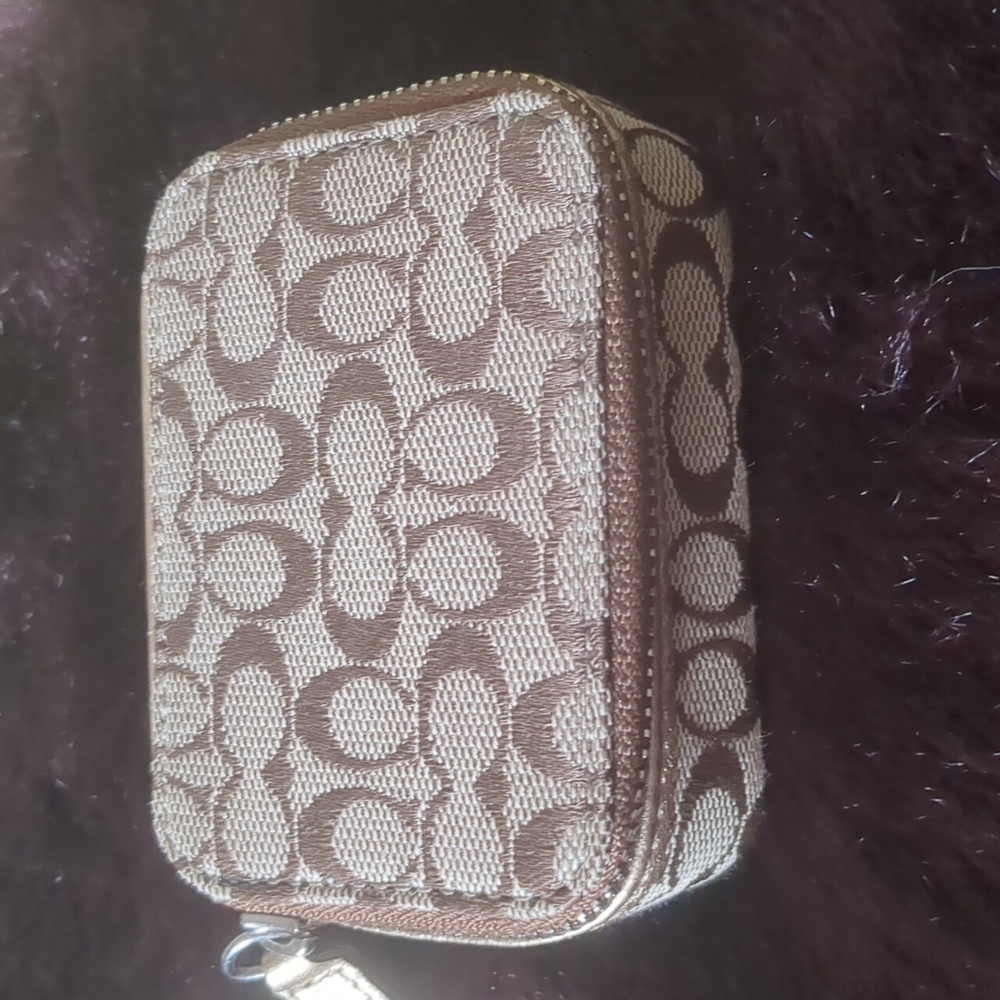 Coach mini pill box